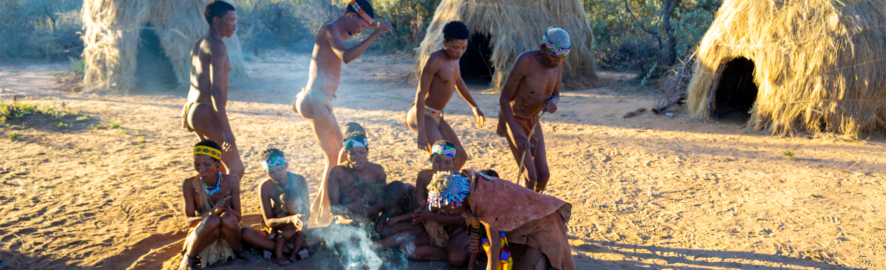 San people dancing around the fire at Harnas Guest Farm